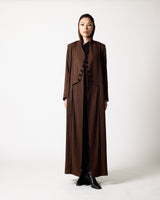 A model stands against a plain light gray studio background wearing a long brown wrap-style coat over a black outfit with black boots.عبايات قطر | Abaya Qatar
عبايات الدوحة | Abayas Doha
عباية قطر | Abaya Doha
عبايات اونلاين قطر | Abayas Online Qatar
عبايات أونلاين قطر | Online Abayas Qatar
شراء عبايات قطر | Buy Abaya Qatar
شراء عبايات اونلاين | Buy Abayas Online
متجر عبايات قطر | Abaya Store Qatar
محل عبايات قطر | Abaya Shop Qatar
بوتيك عبايات قطر | Abaya Boutique Qatar
عبايات نسائية قطر | Ladies Abayas Qa